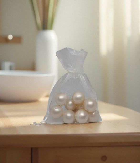 9 perles de bain ronde parfum coco dans un sachet organza